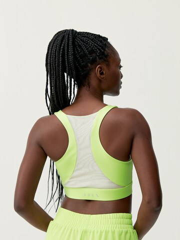 Haut de sport 'Padma 2.0' Born Living Yoga en vert