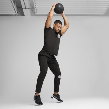 PUMA Tapered Sporthose 'Train All Day' in Schwarz