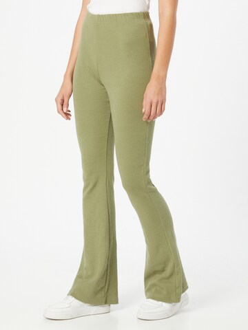 Public Desire Flared Pants in Green: front