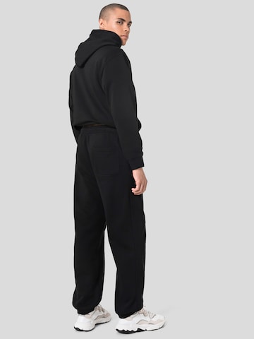 WEEKDAY Tapered Trousers in Black