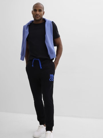 bonprix Tapered Hose in Schwarz