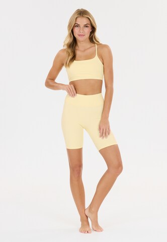Athlecia Low Support Sport-BH 'Blossom' in Gelb