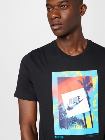 Nike Sportswear - Camiseta 'HEATWAVE' en negro