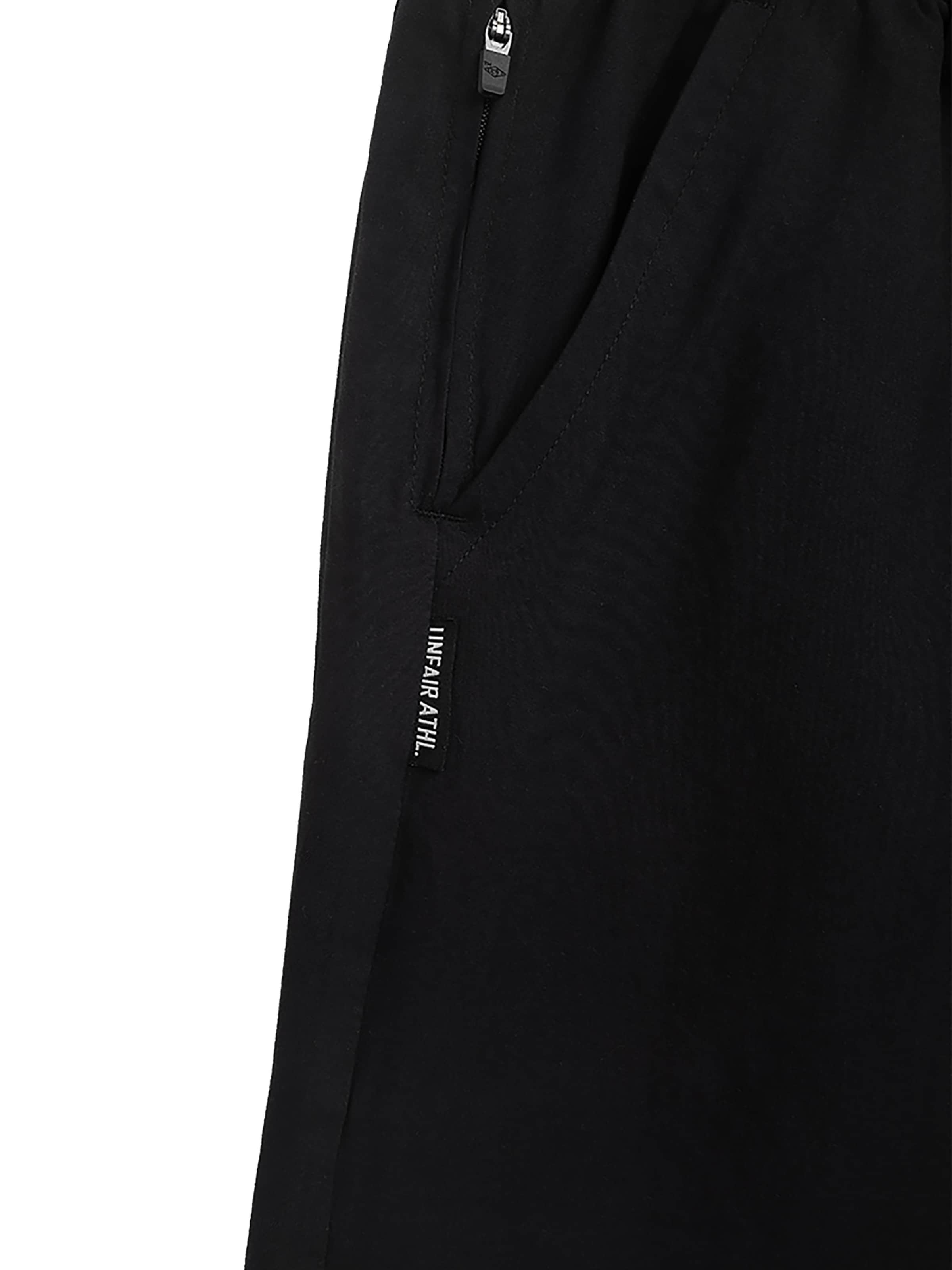 Loosefit Pantaloncini da bagno 'Woodland' di Unfair Athletics in nero