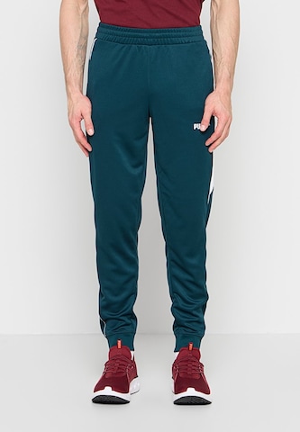 Effilé Pantalon de sport PUMA en vert : devant