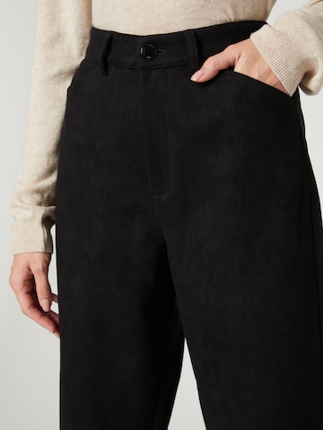 Guido Maria Kretschmer Women - Pierna ancha Pantalón 'Nia' en negro