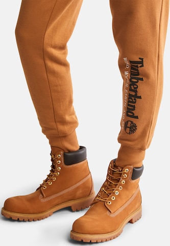 TIMBERLAND Zúžený Kalhoty – hnědá