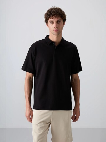 T-Shirt Tommy Life en noir : devant