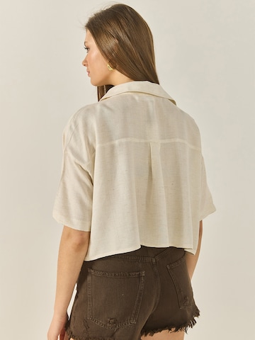 Bianco Lucci Blus i beige