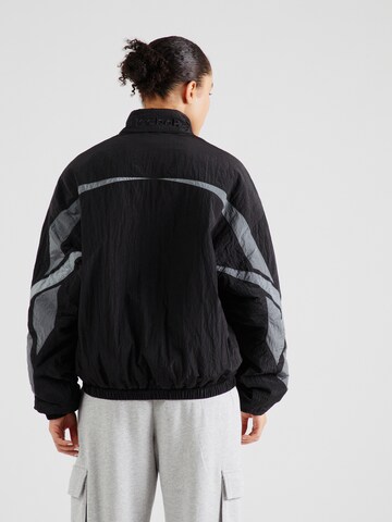 Reebok - Chaqueta de entretiempo en negro