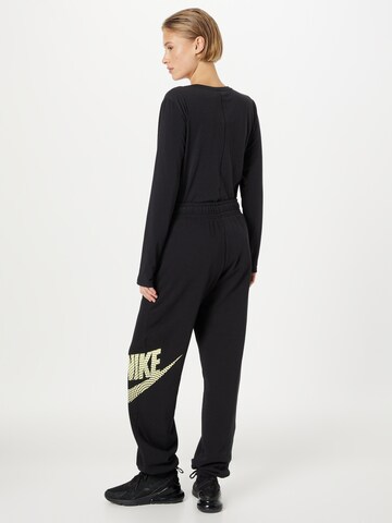 juoda Nike Sportswear Siaurėjantis Kelnės 'EMEA'