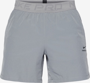 Pantaloni sportivi di NIKE in grigio: frontale