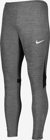 Effilé Pantalon de sport NIKE en gris : devant