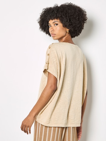 Haut Apricot en beige