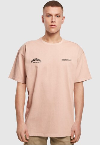 Merchcode Shirt 'Barely Awake' in Oranje: voorkant