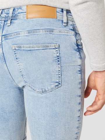 River Island Slimfit Jeans 'SHAGGY' in Blauw