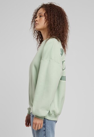 Sweat-shirt Karl Kani en vert