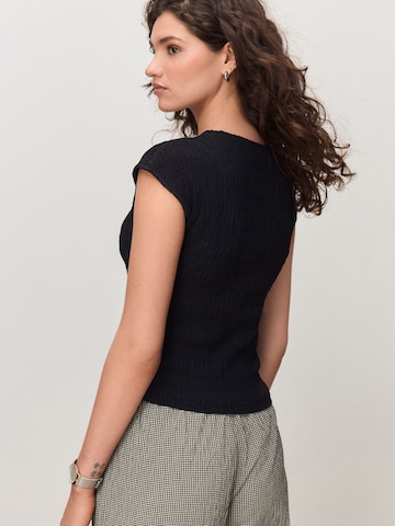 T-shirt Next en noir