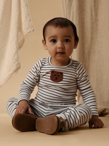 Tutina / body per bambino di Lil'Atelier in bianco