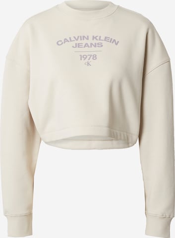 Calvin Klein Jeans كنزة رياضية بلون بيج: الأمام