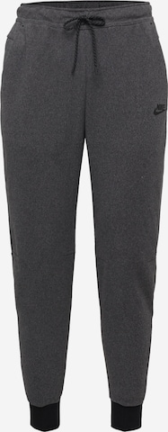 Nike Sportswear Trousers in Black: front