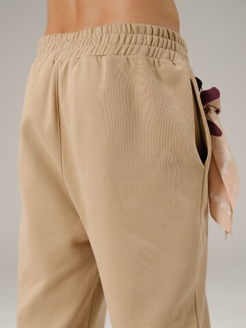 Alessandro Magno Loosefit Sporthose 'GINGER ROOT' in Beige