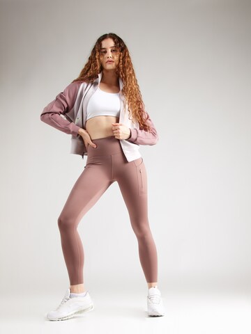 Skinny Pantalon de sport NIKE en marron