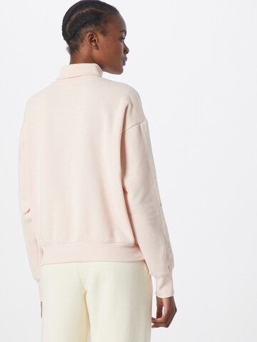 Champion Authentic Athletic Apparel Sweatshirt in Pink