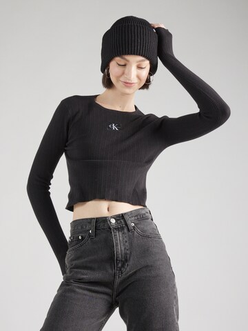 Pull-over Calvin Klein Jeans en noir : devant