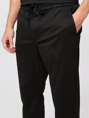 Loosefit Pantalon 'Taber' BOSS en noir