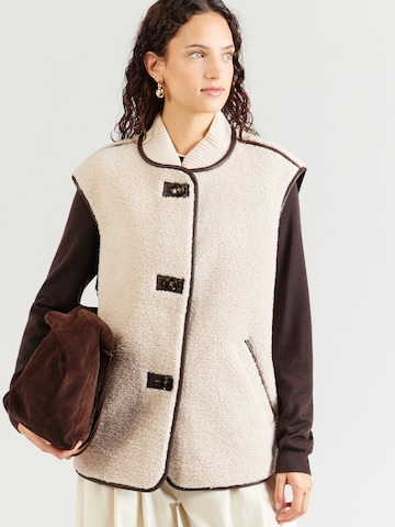 COMMA - Chaleco en beige: frente