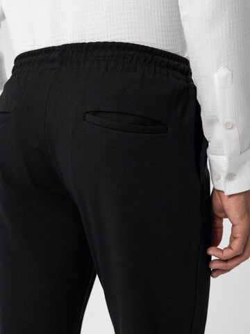 Slimfit Pantaloni di Antioch in nero
