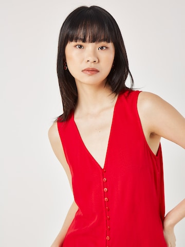 Chemisier Apricot en rouge