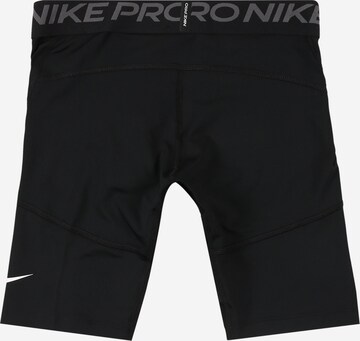 Lenjerie sport de la NIKE pe negru