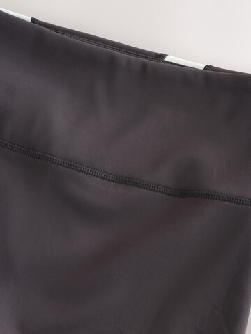 Next Skinny Funkcionalne hlače 'Active Power' | siva barva