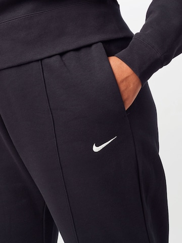 juoda Nike Sportswear Siaurėjantis Kelnės