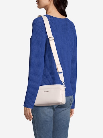 Calvin Klein Taška cez rameno - Béžová