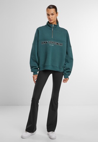 Sweat de sport Aim'n en vert