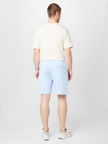 regular Pantaloni 'Club' di Nike Sportswear in blu