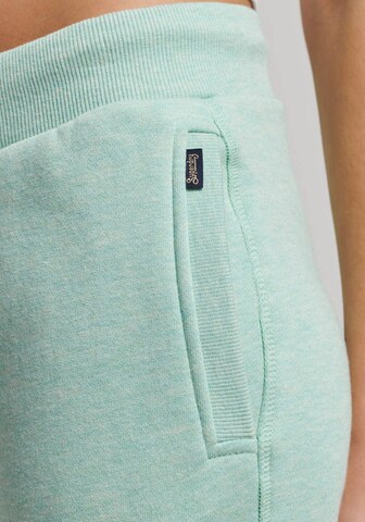 Superdry Tapered Broek 'Essential' in Groen