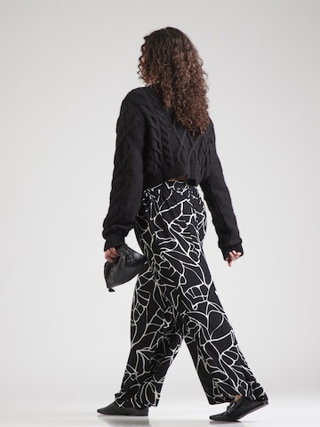 ONLY Carmakoma Wide leg Pants 'CARELICIA' in Black