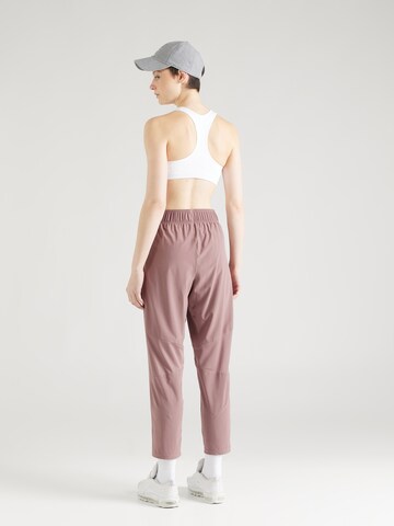 NIKE - Tapered Pantalón deportivo 'FAST' en lila