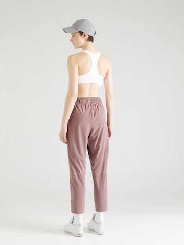 NIKE Tapered Sportsbukser 'FAST' i lilla