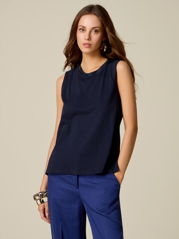 Top di oltre in blu