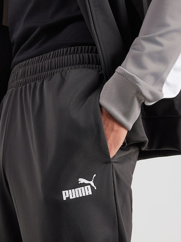 PUMA Облекло за трениране 'ESS' в черно