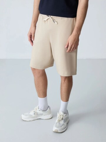 Pantaloni di Tommy Life in beige
