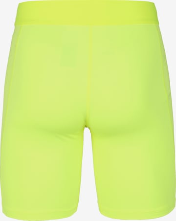 NIKE Skinny Sportunterhose in Gelb