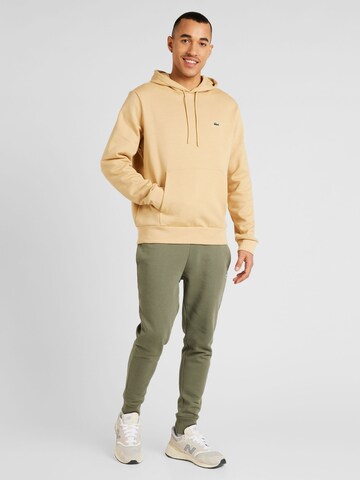 LACOSTE Sweatshirt i beige