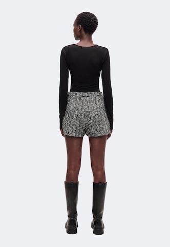 Jupe 'Emely' ABOUT YOU en noir : derrière