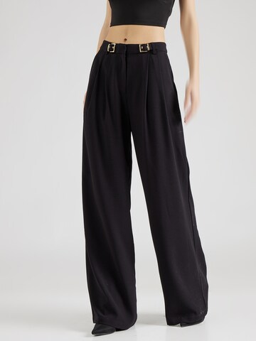 Hoermanseder x About You Loose fit Pleat-front trousers 'Gigi' in Black: front
